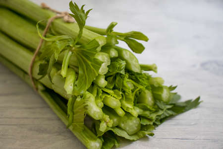 celery stalks on a wooden background