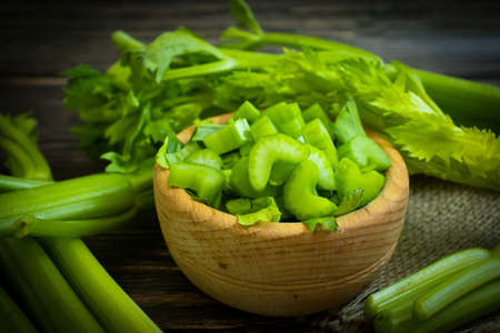 celery stalks on a wooden background