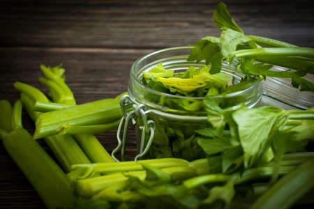 celery stalks on a wooden background