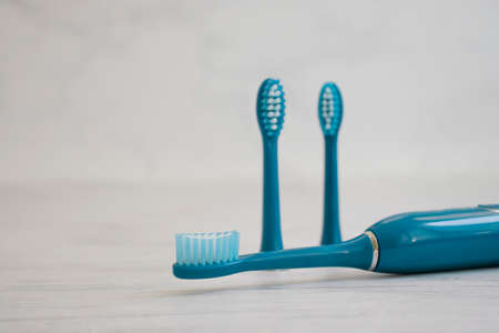 electric toothbrush on a light background