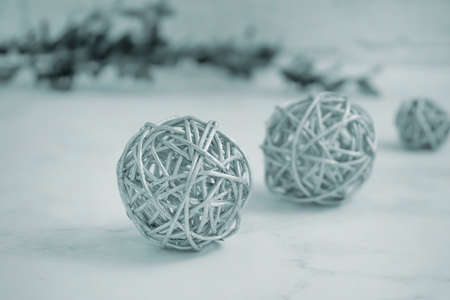 rattan ball, branch on a brick backgroundの写真素材