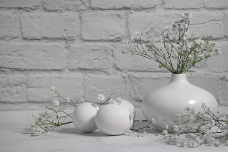 eggs, gypsophila flower on a light background