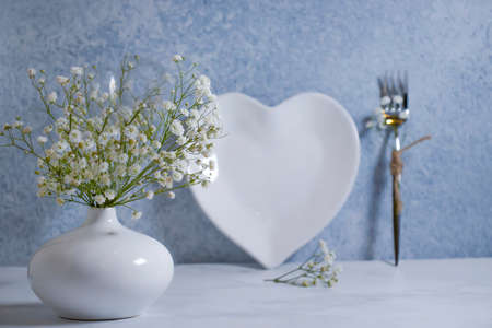 heart-shaped plate, gypsophila flowerの写真素材