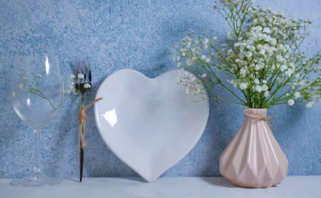heart-shaped plate, gypsophila flowerの写真素材