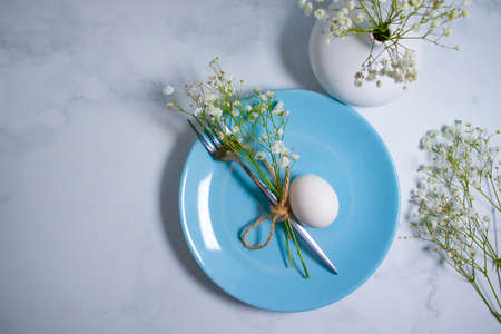 plate, white egg gypsophila flowerの写真素材