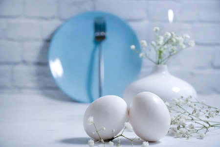 plate, white egg gypsophila flowerの写真素材