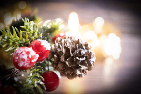 festive christmas background, candle, christmas tree branchの写真素材