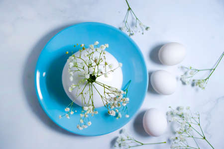 plate, white egg gypsophila flower season decorationの写真素材