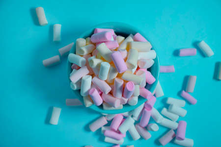 sweet colored marshmallows in a cupの写真素材