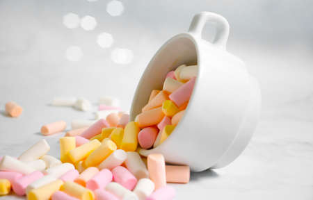 sweet colored marshmallows in a cupの写真素材