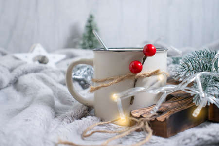 cup of coffee christmas tree branch, festive backgroundの写真素材