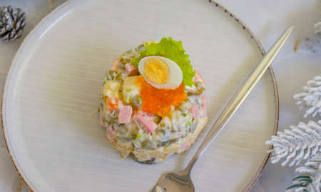 salad olivier, red caviar festive backgroundの写真素材