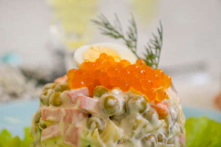salad olivier, red caviar festive backgroundの写真素材