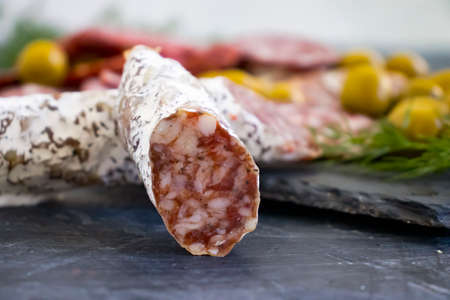 delicious sausage, olives, dill background assortment menu