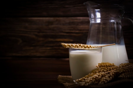 oat milk on wooden backgroundの写真素材