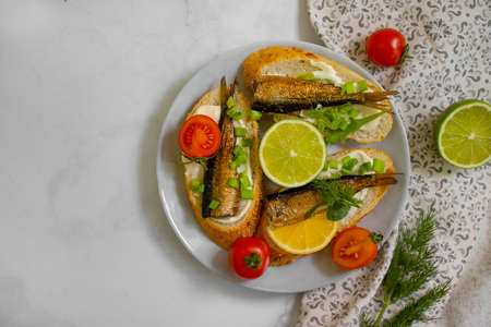 sandwich in a can, fresh dill on wooden backgroundの写真素材