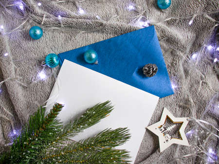 envelope, christmas tree branch, alarm clock christmas backgroundの写真素材