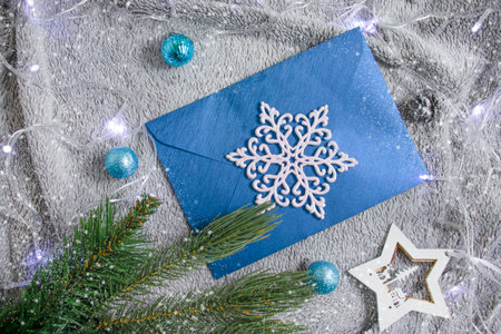 envelope, christmas tree branch, alarm clock christmas backgroundの写真素材