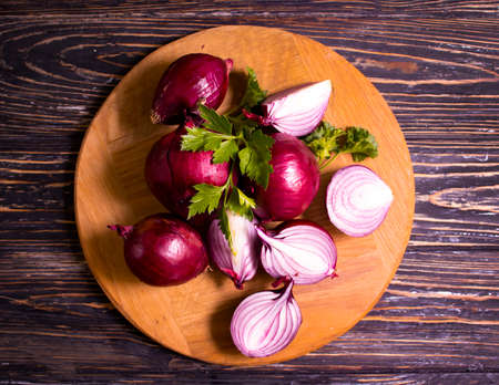 blue onion, parsley on wooden backgroundの写真素材