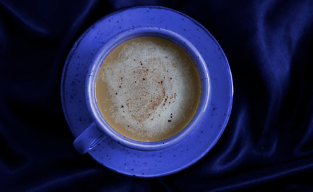 cups of coffee on a silk background
