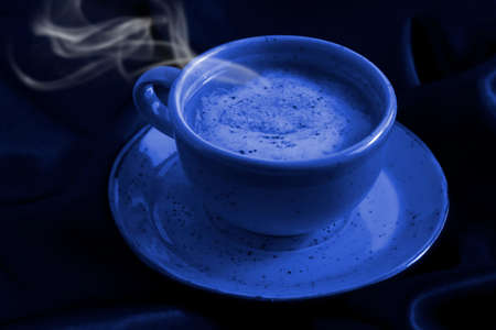 cups of coffee on a silk backgroundの写真素材