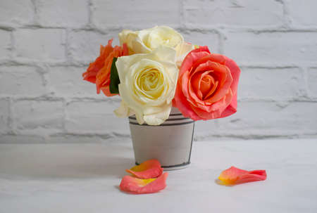 rose flower in vase on old backgroundの写真素材