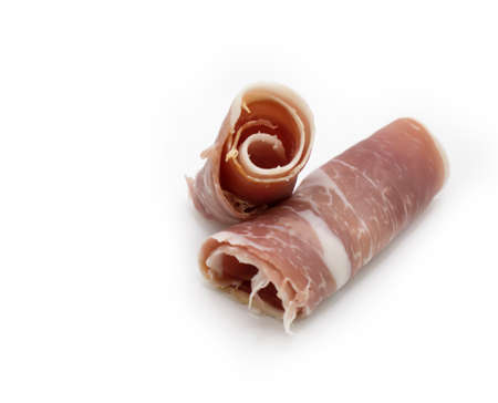 Jamon slice isolated on white backgroundの写真素材