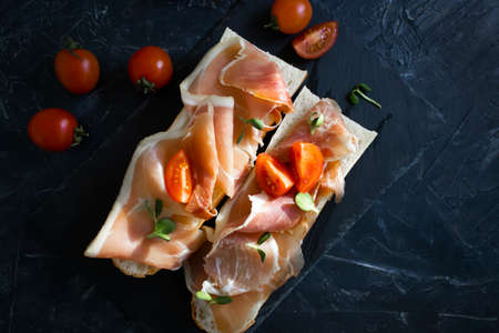 delicious sandwich with jamon, tomatoの写真素材