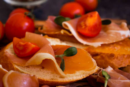 delicious sandwich with jamon, tomatoの写真素材