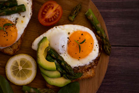 fried egg sandwich, asparagus, avocadoの写真素材