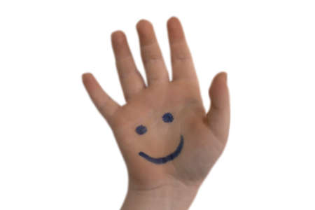 hand of a child with a painted smile on a white backgroundの写真素材