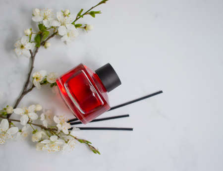 Perfume for home flower on a light backgroundの写真素材