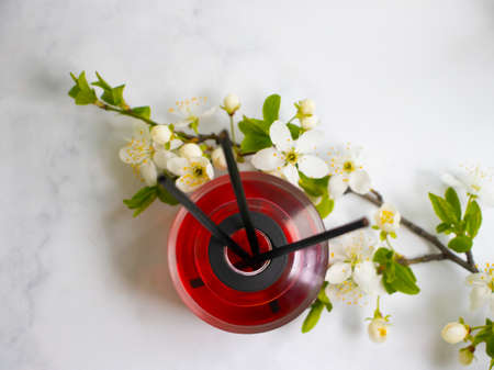 Perfume for home flower on a light background