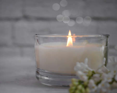 aroma candle flower lilac in the apartmentの写真素材