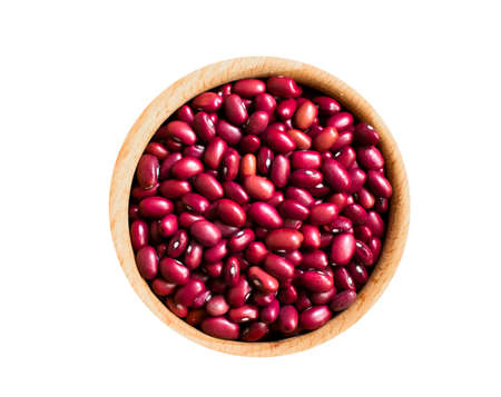 Plate with raw beans isolated on white background