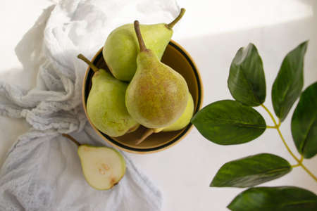 Fresh pear plate on light backgroundの写真素材