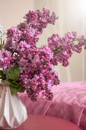 Beautiful bouquet of blooming lilacs in the roomの写真素材