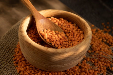 Dry red lentils on old backgroundの写真素材