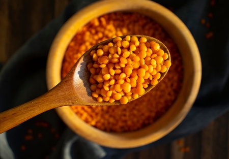 Dry red lentils on old backgroundの写真素材