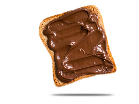 Bread with chocolate paste isolated on white backgroundの写真素材