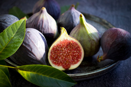 Fresh figs on old background