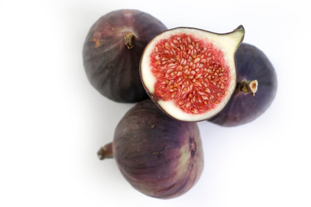 Fresh fig cut isolated on white background