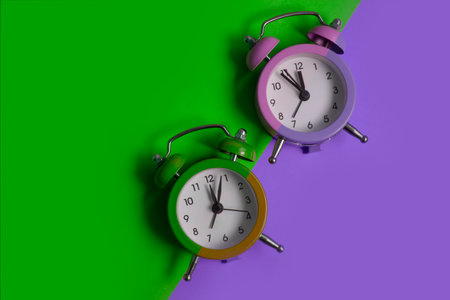 Alarm clock on a colored background