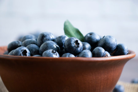 Fresh blueberries on old backgroundの写真素材