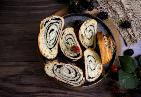 Poppy seed roll on old background