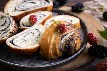Poppy seed roll on old background