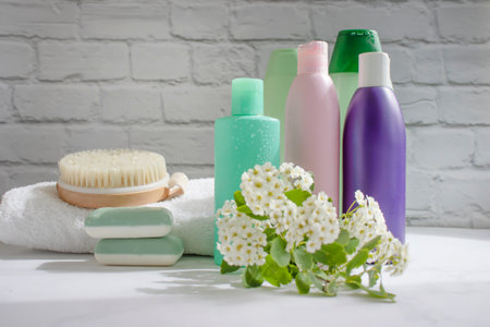 Shampoo bottle, soap, flower on old backgroundの写真素材