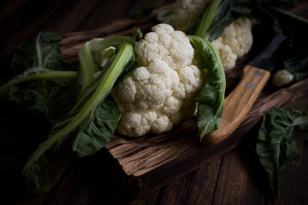 Fresh cauliflower on old backgroundの写真素材
