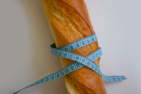 Baguette measuring tape on a light backgroundの写真素材