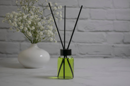 Home fragrance flowers on a light background